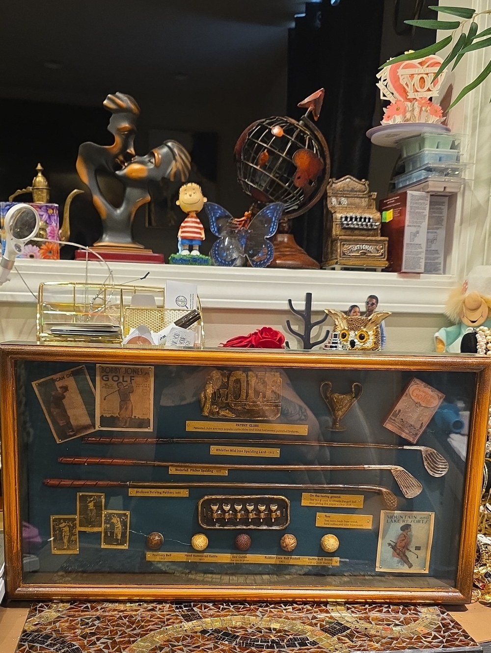 Spalding Gold Plaque Golf Display on Dark Blue Mat
